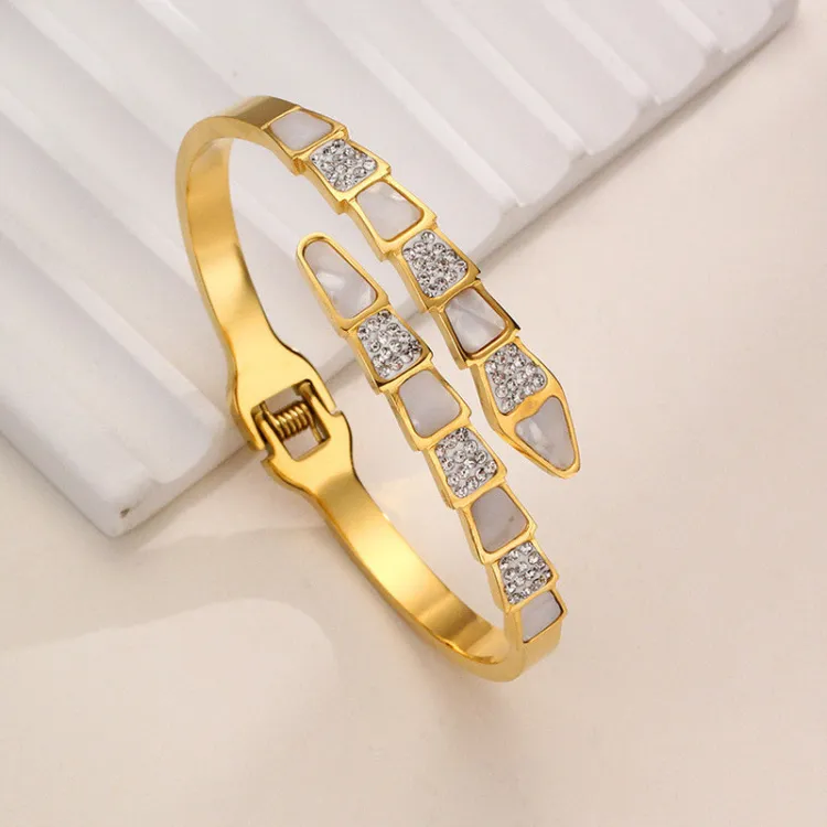 Stainless Steel Gold Plated Mother of Pearl Snake Styled AD Studded Anti-Tarnish Bracelet For Women - Buy in Vellore