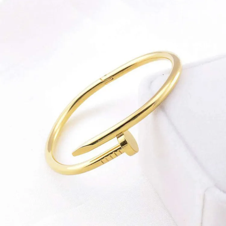 Stainless Steel Gold Plated Stainless Steel Anti Tarnish Nail Bracelet For Women - Buy in Vellore
